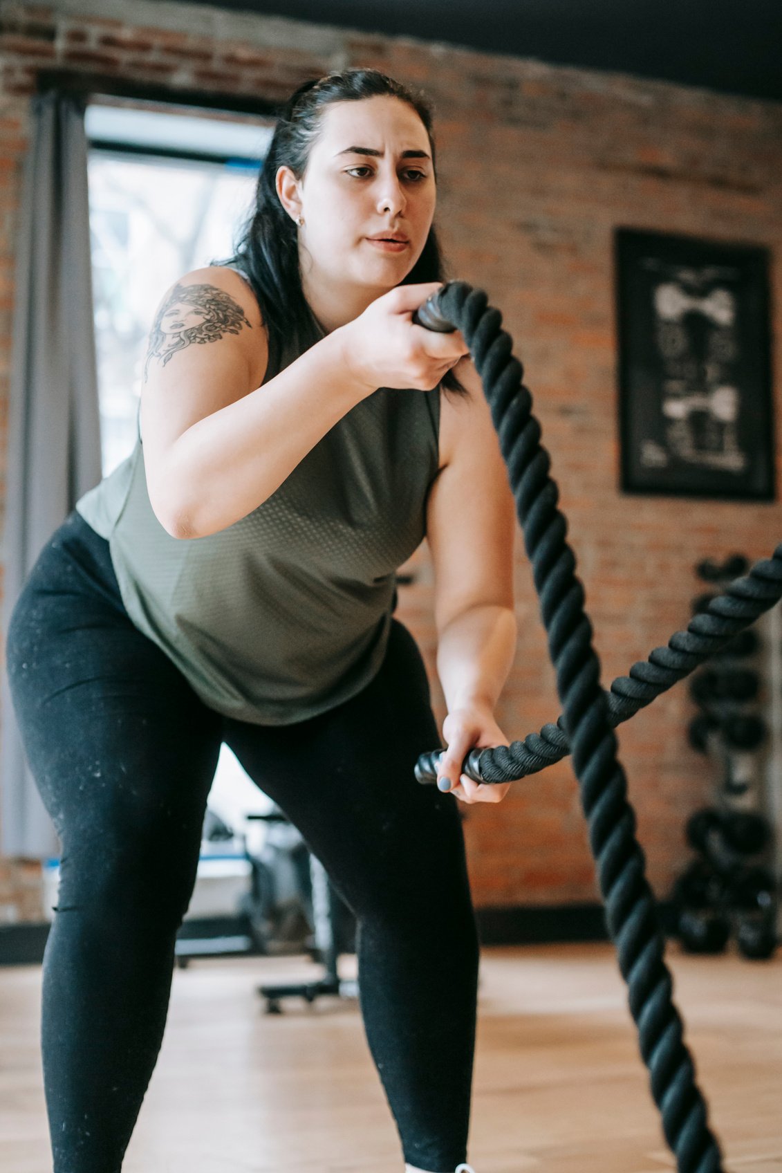 Woman Training in Gym in Daytime